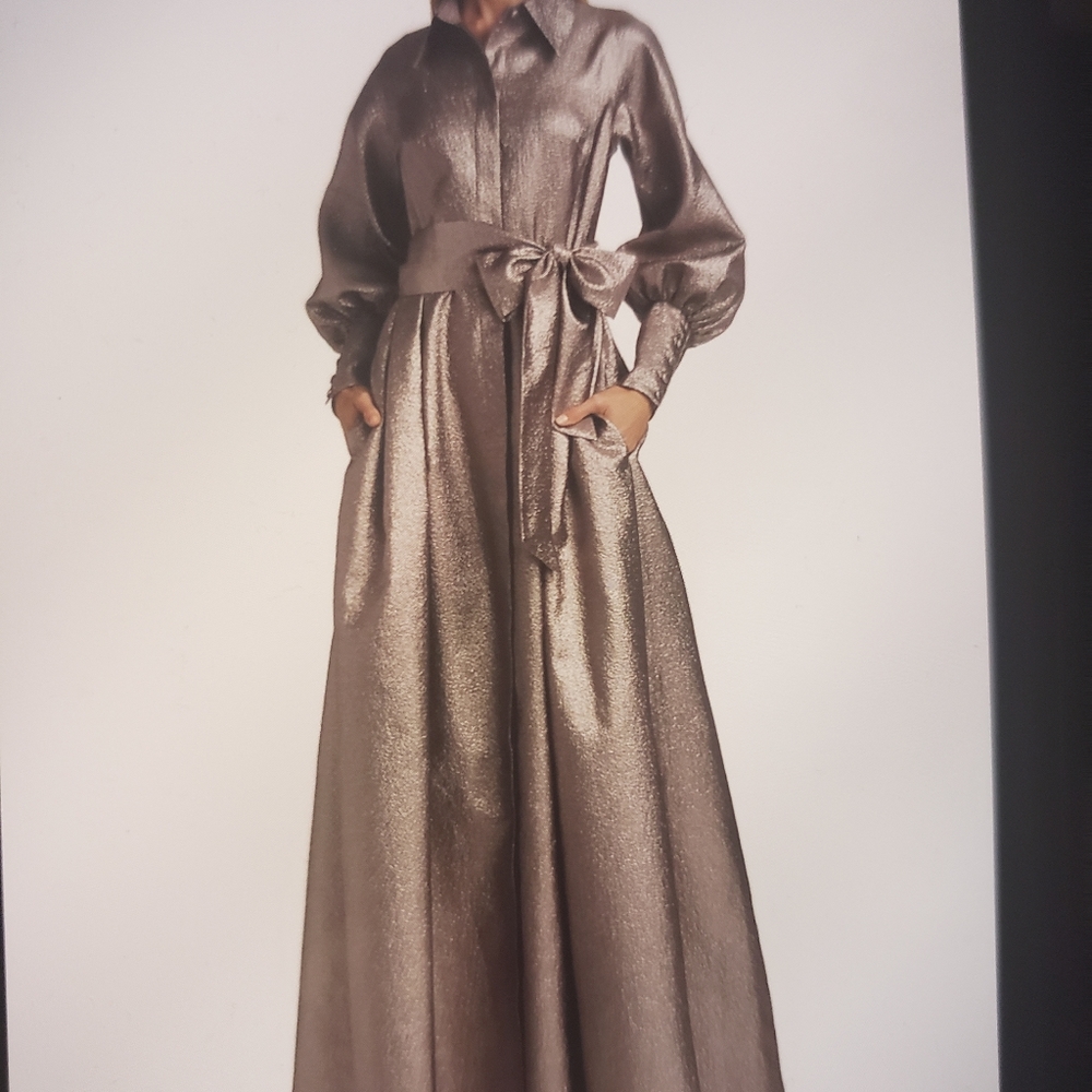 Long metalic shirtdress with dramatic puff sleeve and elegant self-tie bow belt.